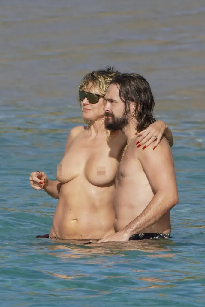 Heidi Klum and Tom Kaulitz in the ocean.