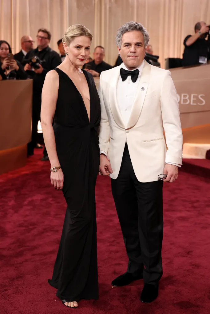 Sunrise Coigney and Mark Ruffalo attend the 83rd Annual Golden Globe Awards.