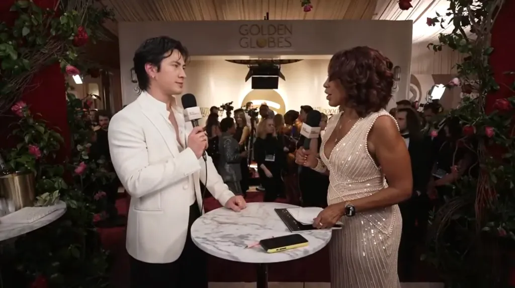 Hudson Williams being interviewed by Gayle King at the Golden Globes.