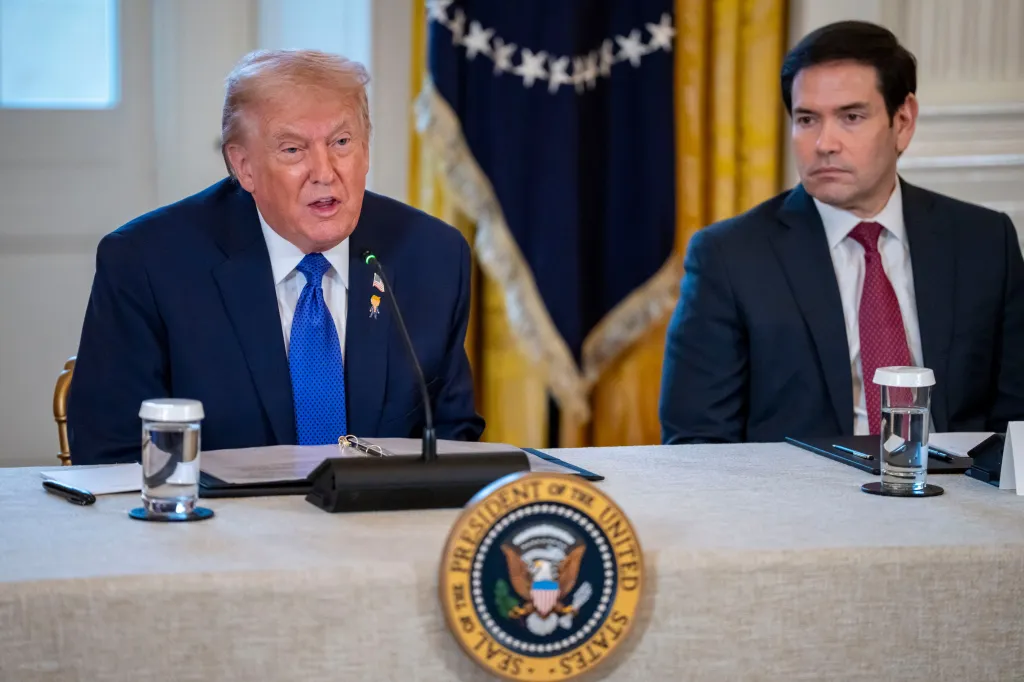 President Donald Trump speaks at a meeting with oil and gas executives as Secretary of State Marco Rubio looks on.