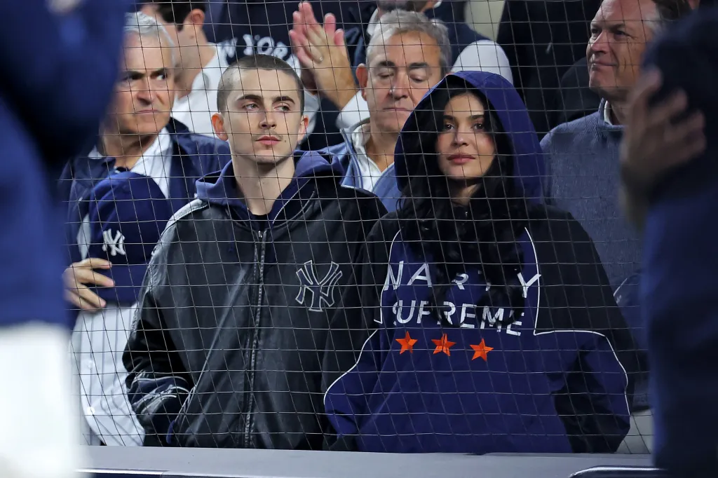 Timothée Chalamet and Kylie Jenner watching the MLB playoffs.