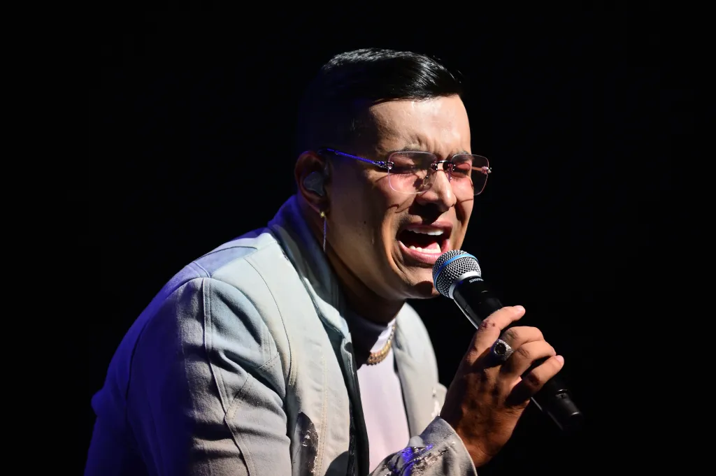 Yeison Jimenez performs live on stage during the "Invencible Tour" at James L. Knight Center on October 7, 2023 in Miami, Florida.