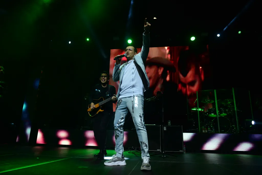  Yeison Jimenez performs live on stage during the "Invencible Tour" at James L. Knight Center on October 7, 2023 in Miami, Florida.