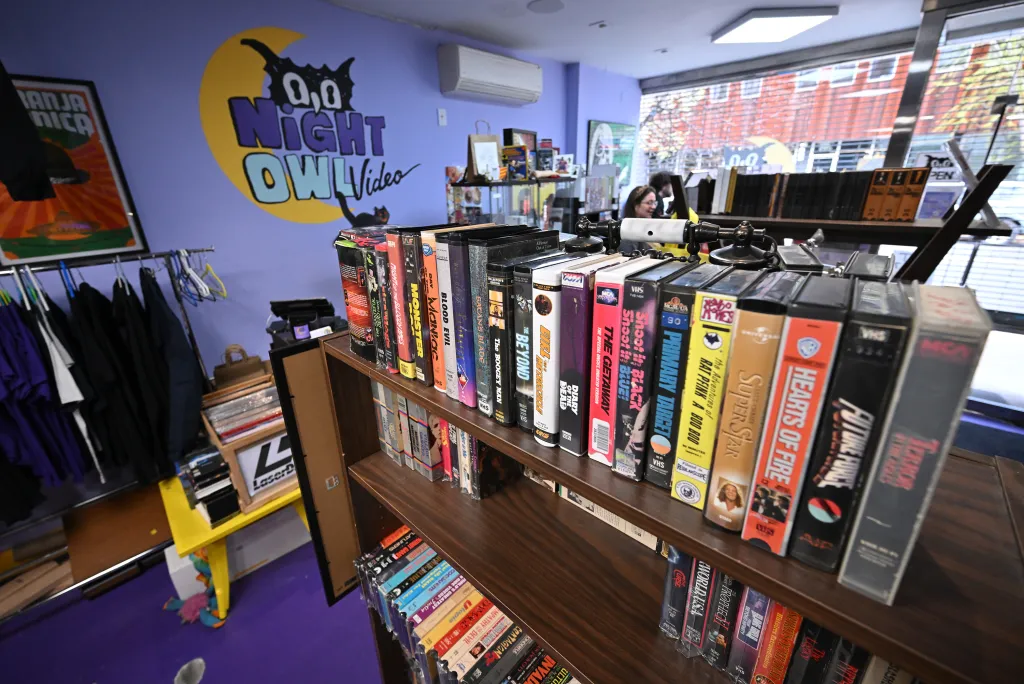 A collection of VHS tapes from Night Owl Video, including "The Getaway" and "Hearts of Fire."