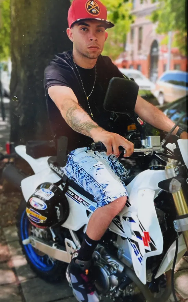 Eric Duprey on a Suzuki motorcycle.