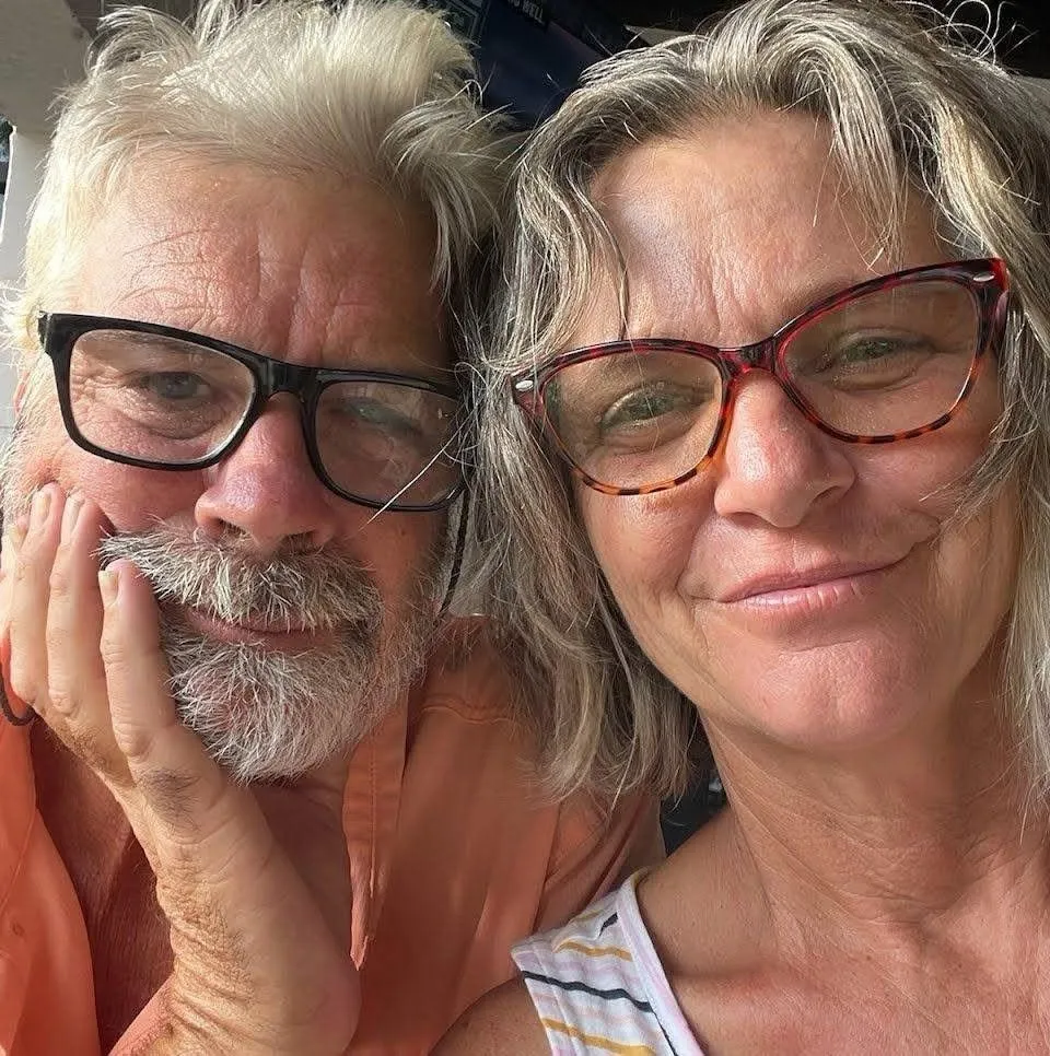 Brian Hooker and his wife Lynette posing for a selfie.
