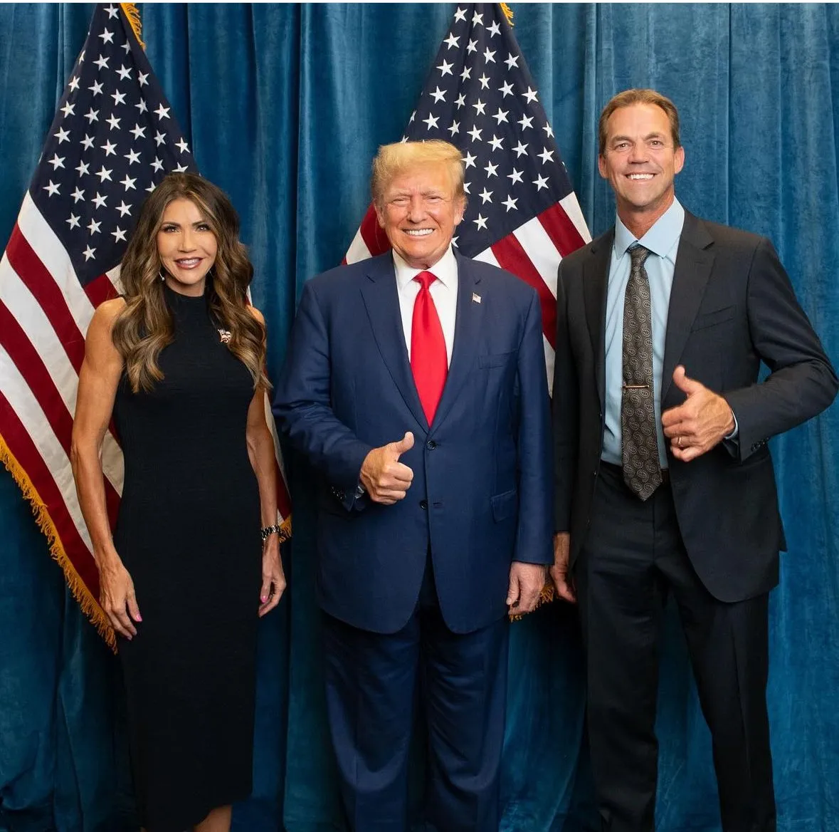 Kristi Noem, President Trump and Bryon Noem post together.