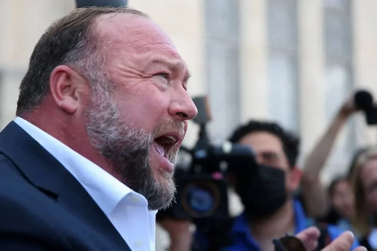 Alex Jones breaks down in tears as he pleads with audience to pray for Trump