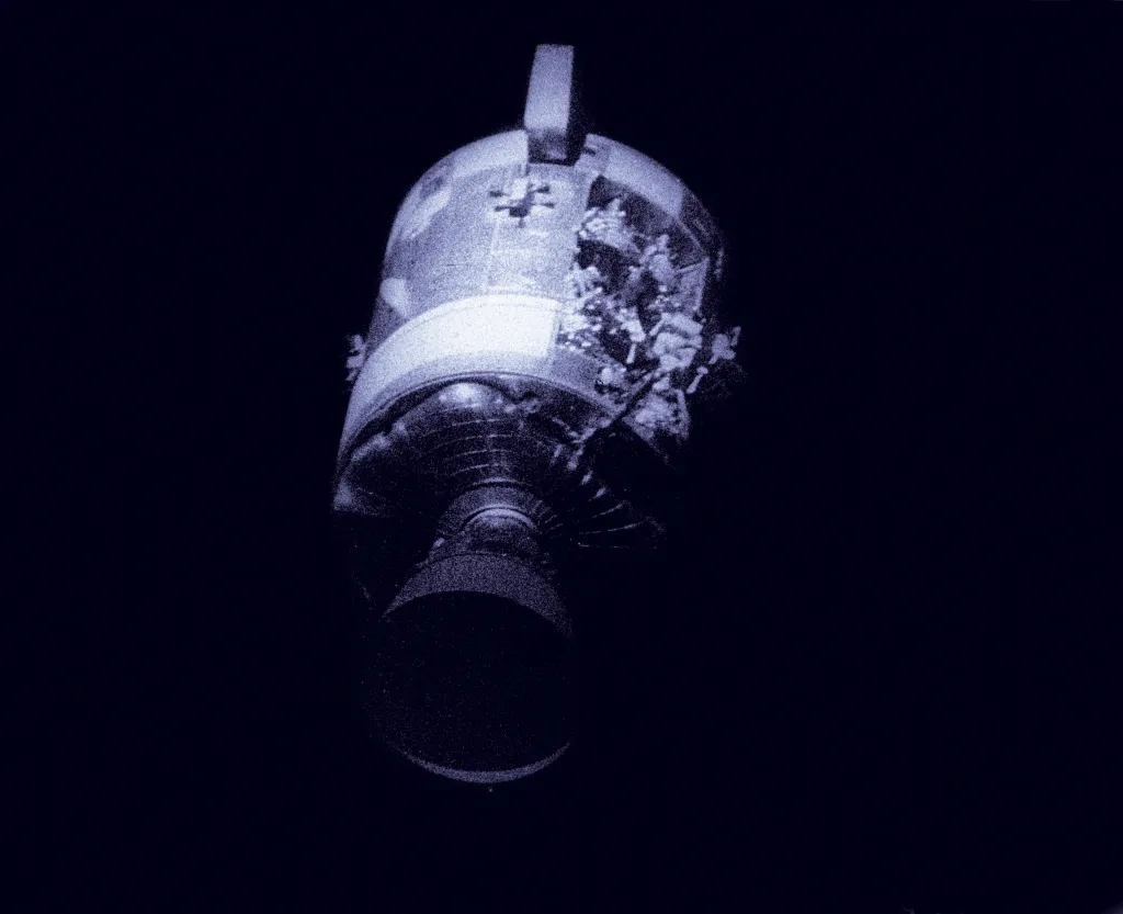 The damaged Apollo 13 Service Module Odyssey as seen from the Command Module.