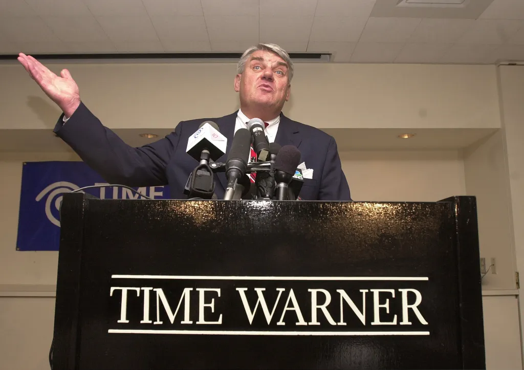 Time Warner Cable CEO Joseph Collins speaks at a news conference.