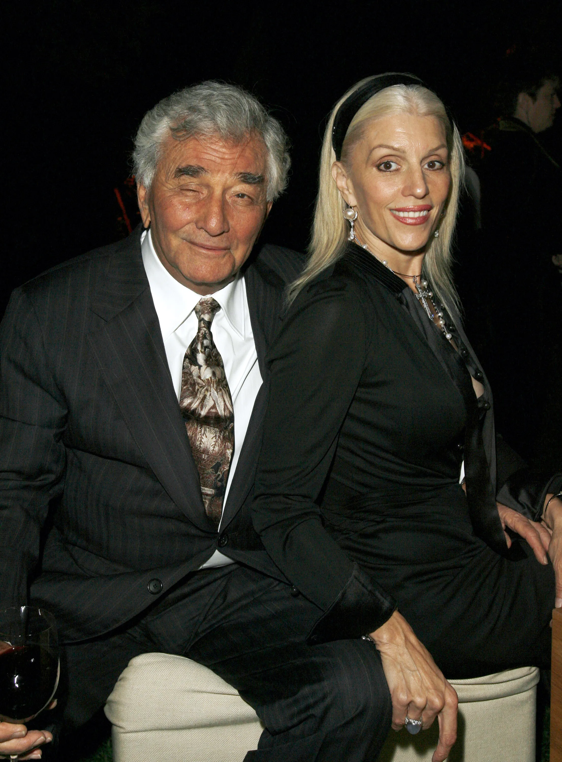 Peter Falk and Shera Falk, a couple, pose together at the "Gucci by Gucci" book party.