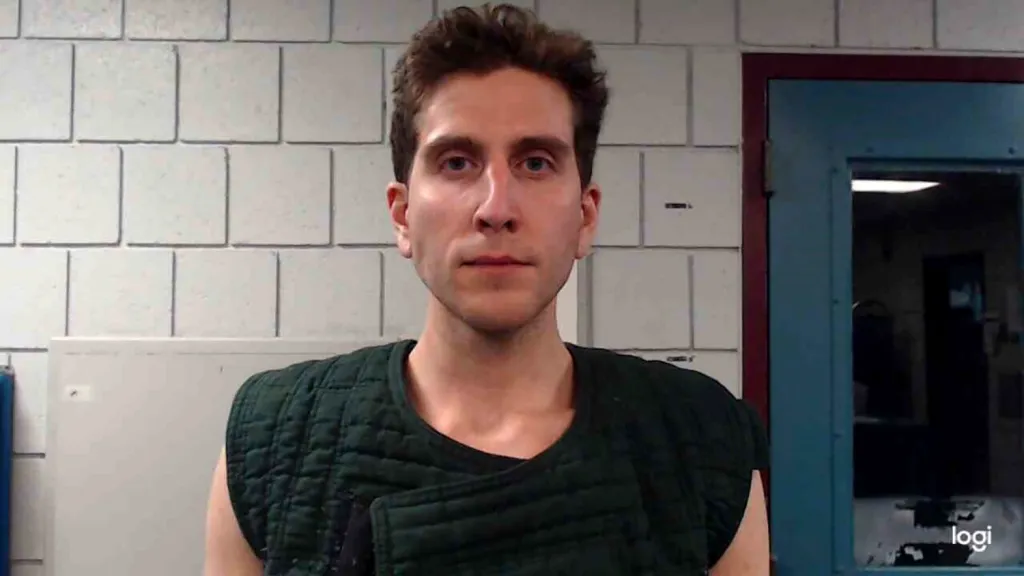 Bryan Koberger wears a suicide vest during a mugshot at the Monroe County Correctional Facility after his arrest on Dec. 30, 2022.