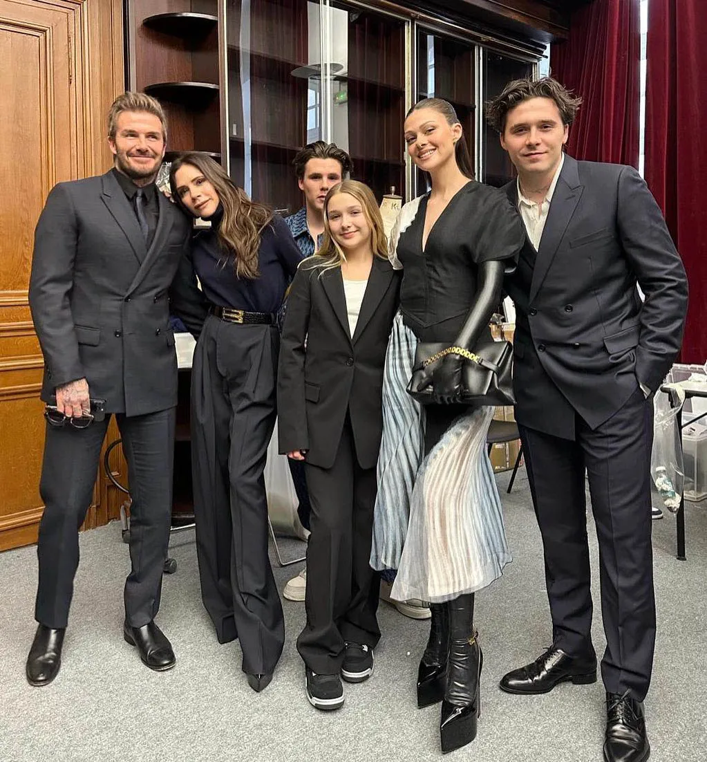 Nicola Peltz, David Beckham, Brooklyn Beckham, Harper Beckham, and Cruz Beckham posing together at Victoria Beckham's Womenswear Fall Winter 2023-2024 show.