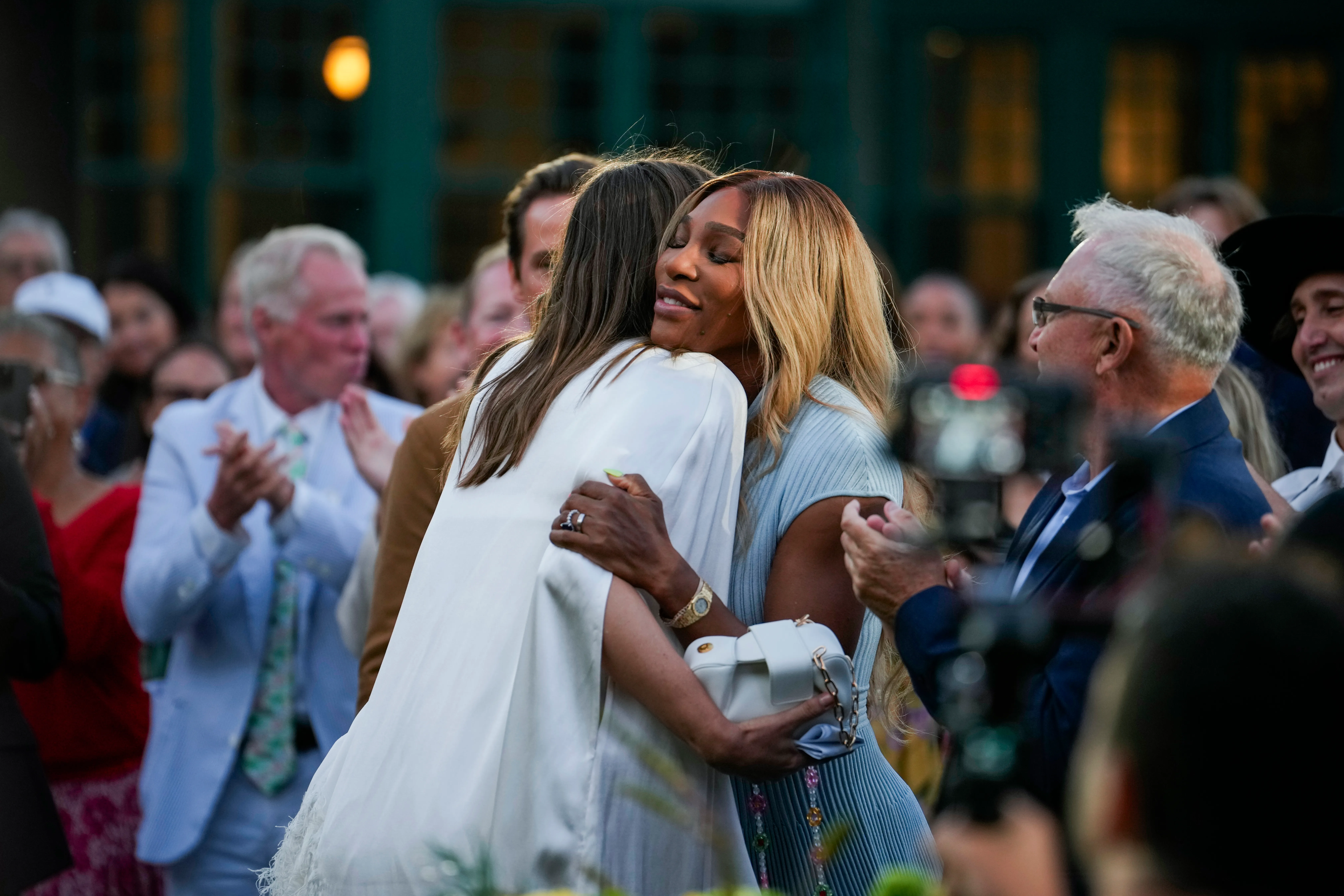 Serena Williams embraces Maria Sharapova during the 2025 Induction Celebration weekend at the International Tennis Hall of Fame