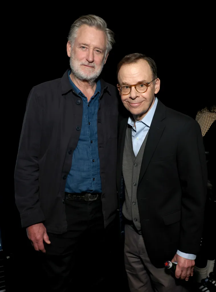 Bill Pullman and Rick Moranis posing at CinemaCon.