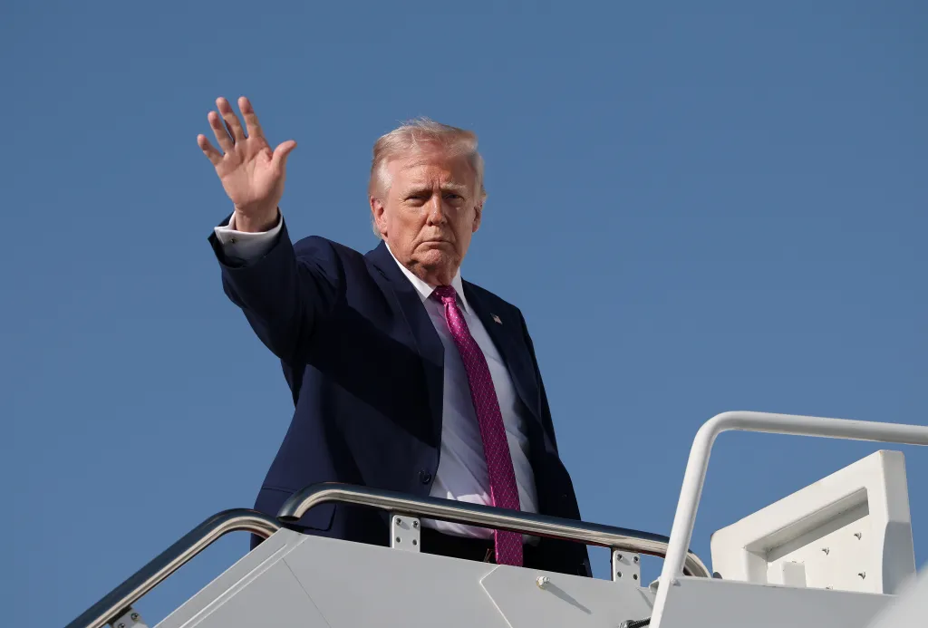 President Trump waving as he departs Washington for Charlottesville.
