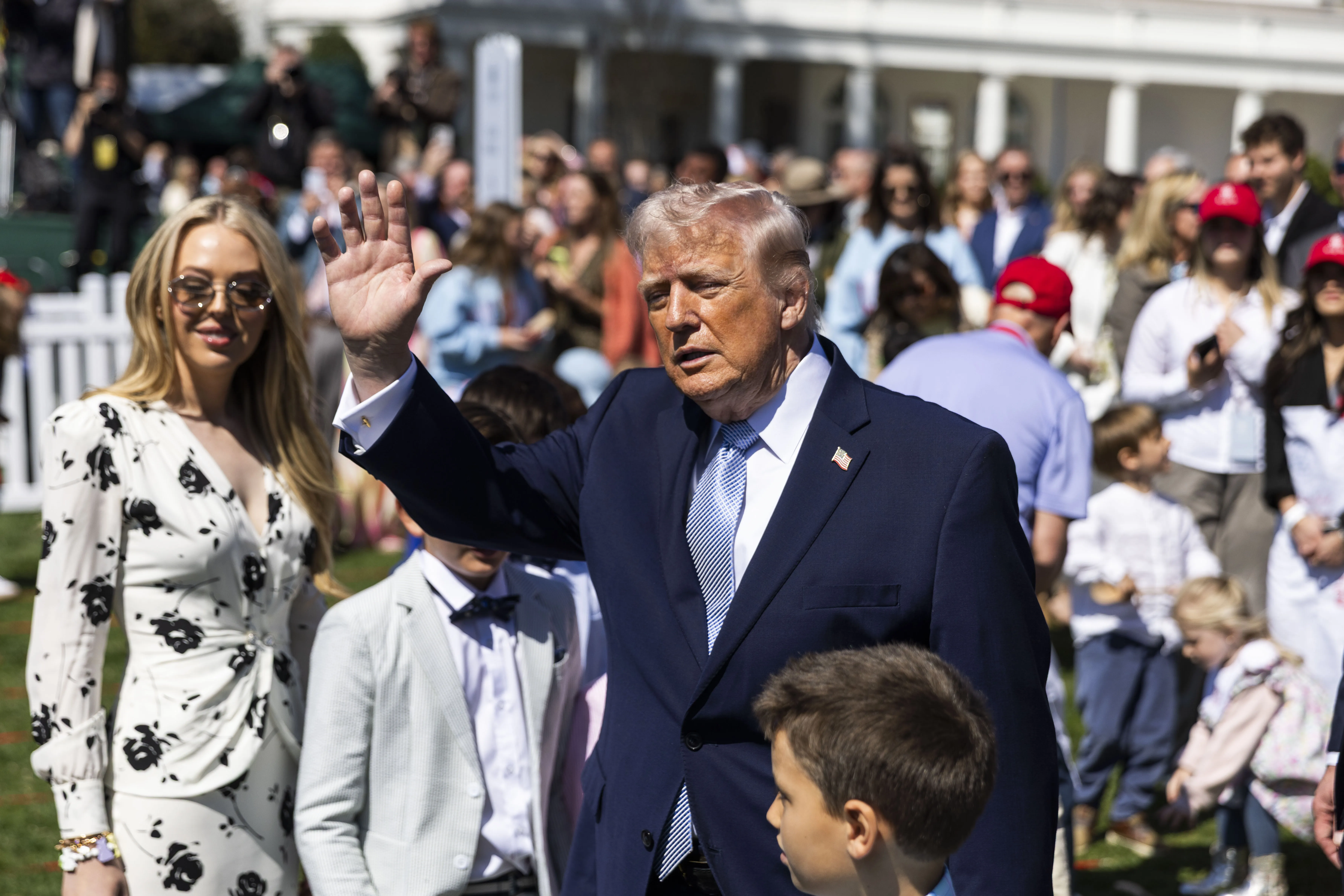 Donald Trump waving with his daughter Tiffany at the White House Easter Egg Roll.