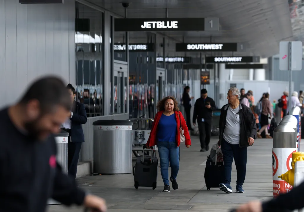 Travelers at Los Angeles International Airport.