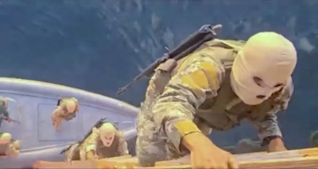 Soldiers in balaclavas climbing onto the container ship MSC Francesca.