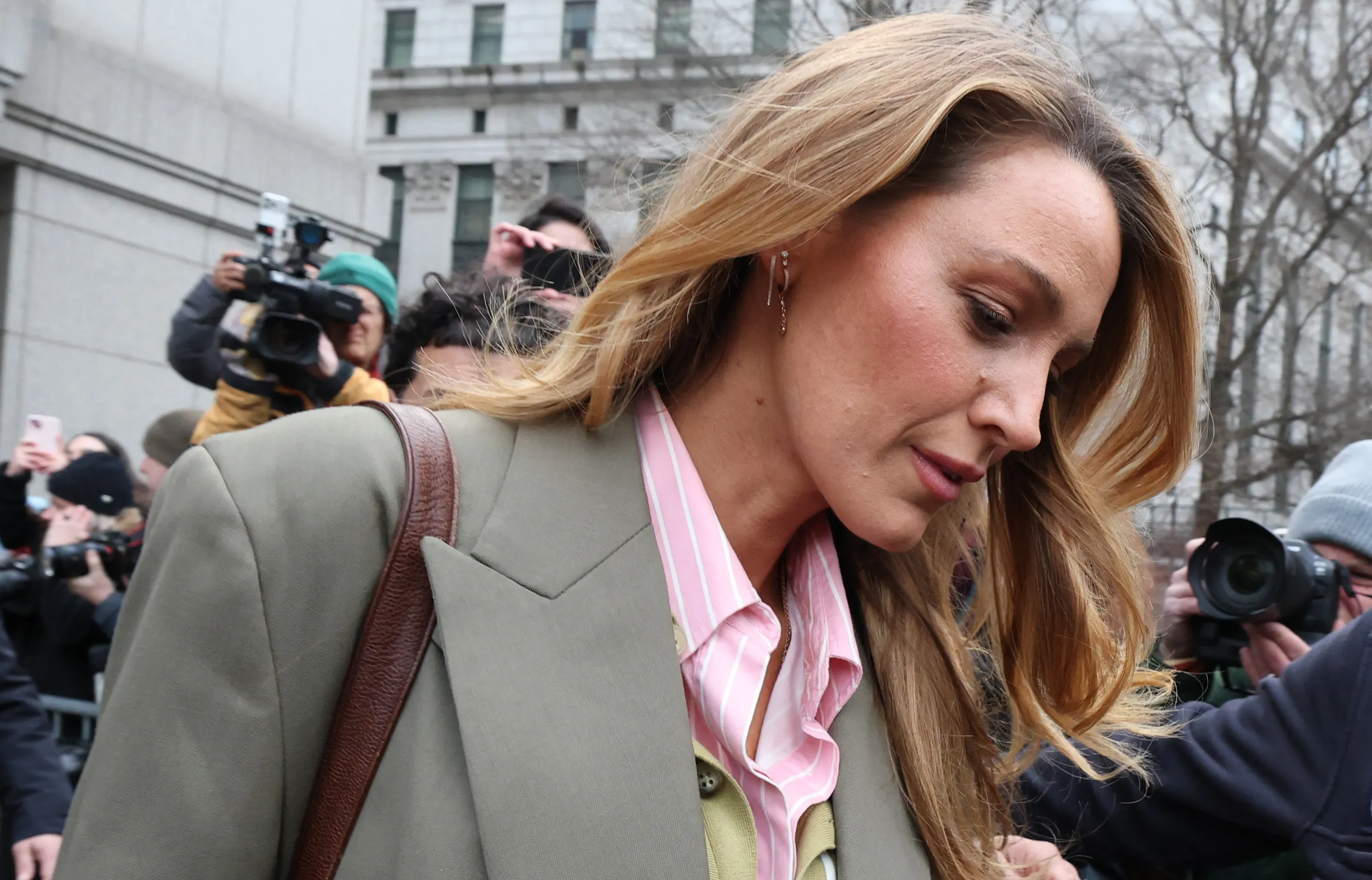 Actress Blake Lively leaves federal court.