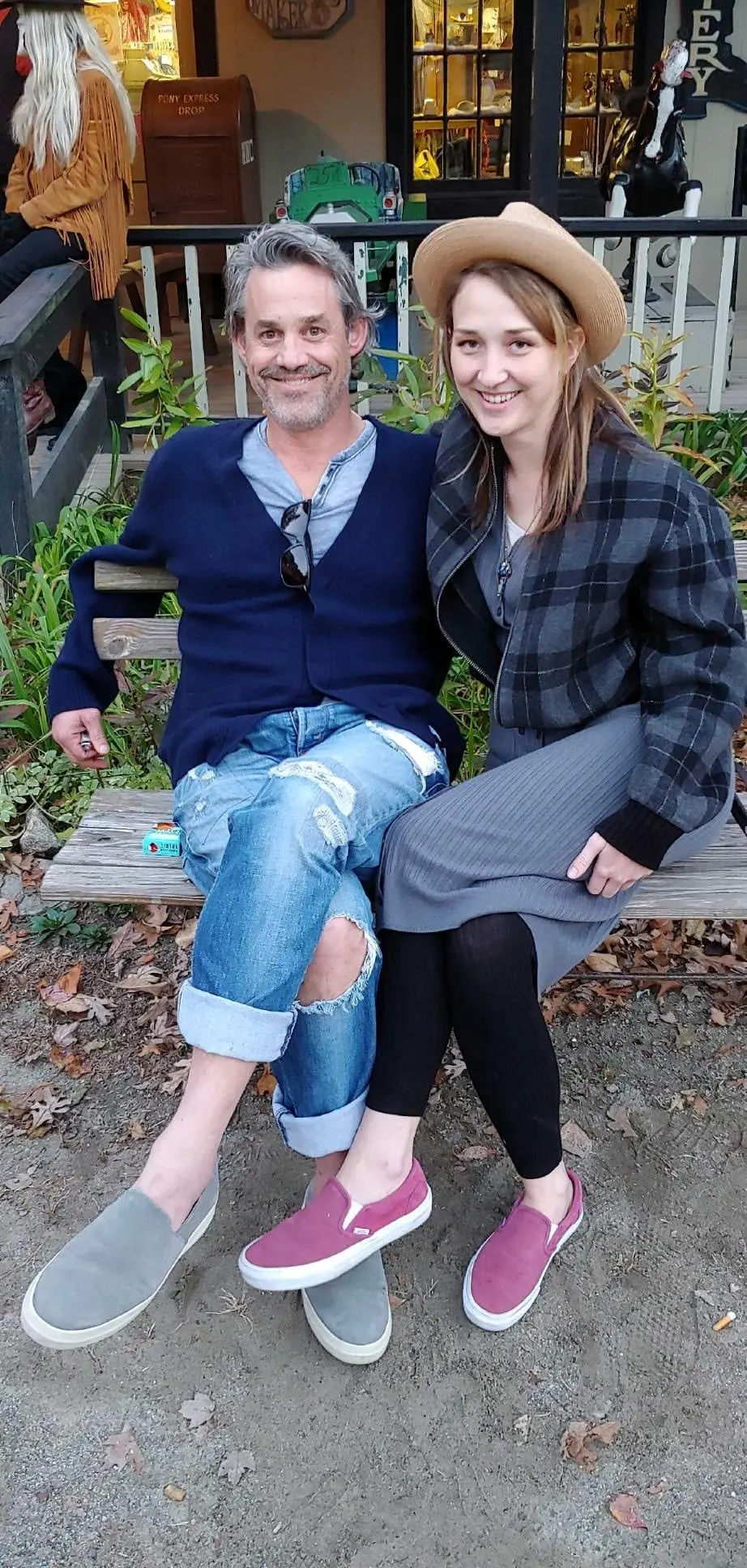 Nicholas Brendon with his ex-girlfriend Sarah Allison sitting on a bench.
