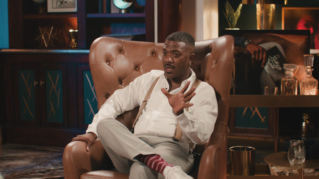 Ray J discusses his alleged sexual history while sitting in a leather armchair.