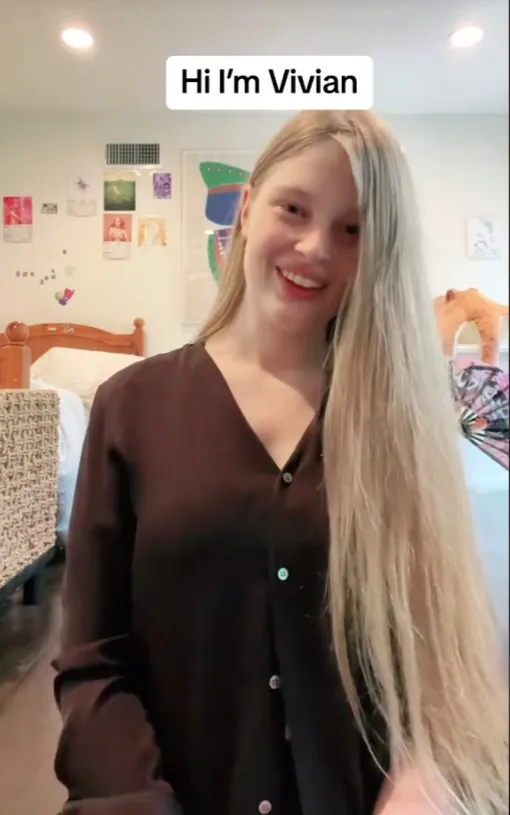 Vivian Jenna Wilson smiling, with a 