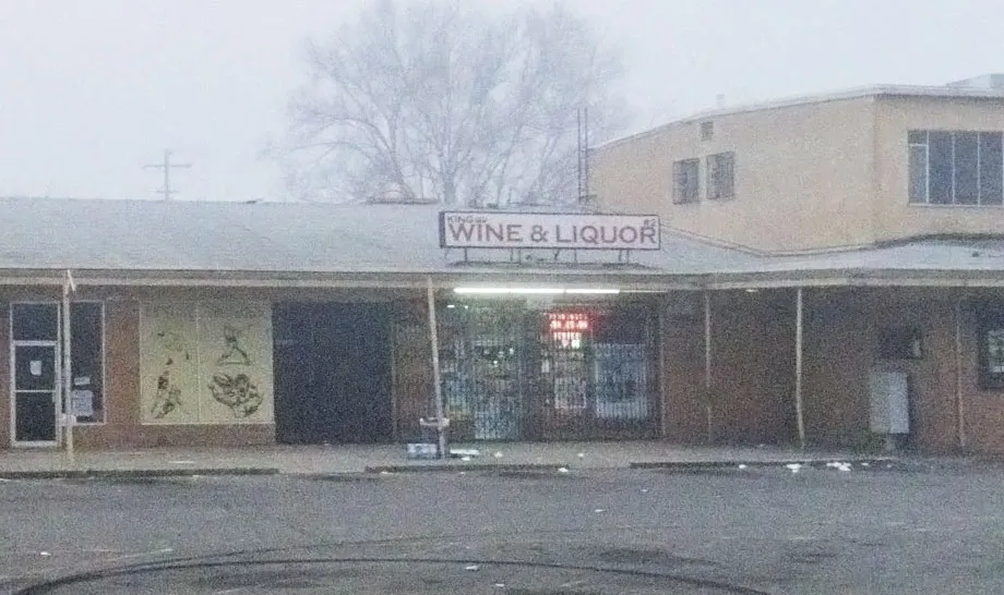 Exterior of King Wine & Liquor 2 on a foggy day.