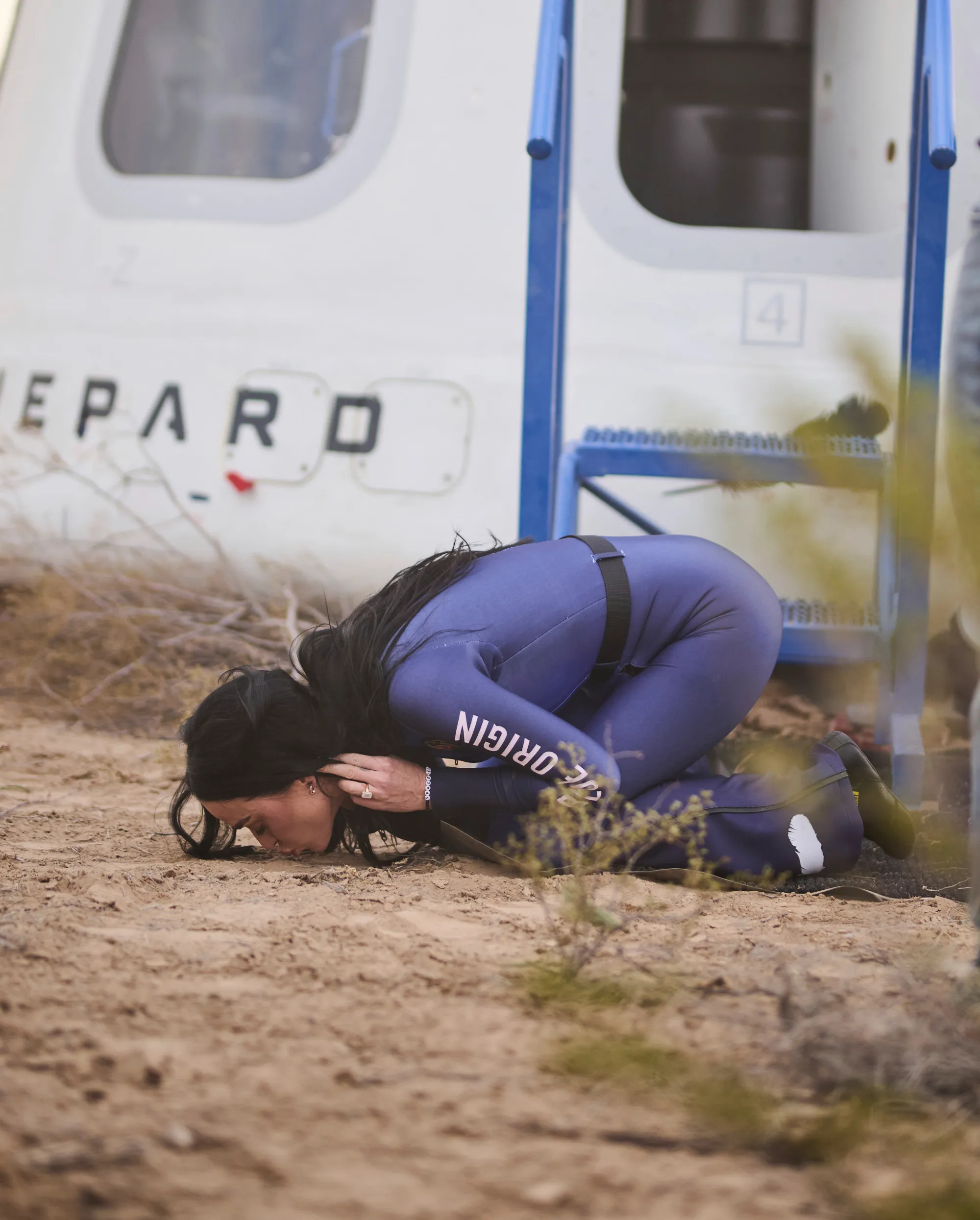 Katy Perry kisses the ground after returning to Earth