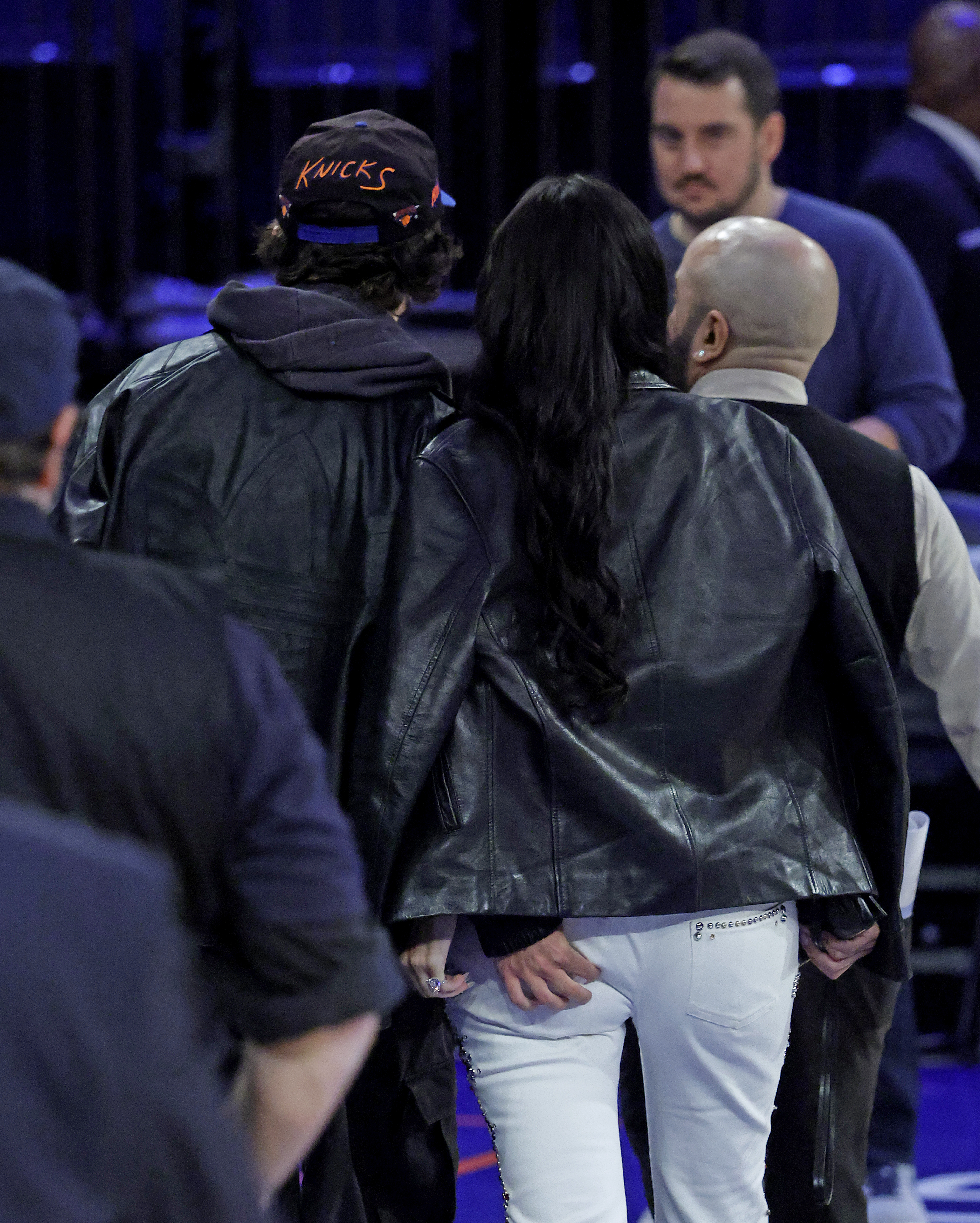 Timothee Chalamet squeezing Kylie Jenner's butt at an NBA game.