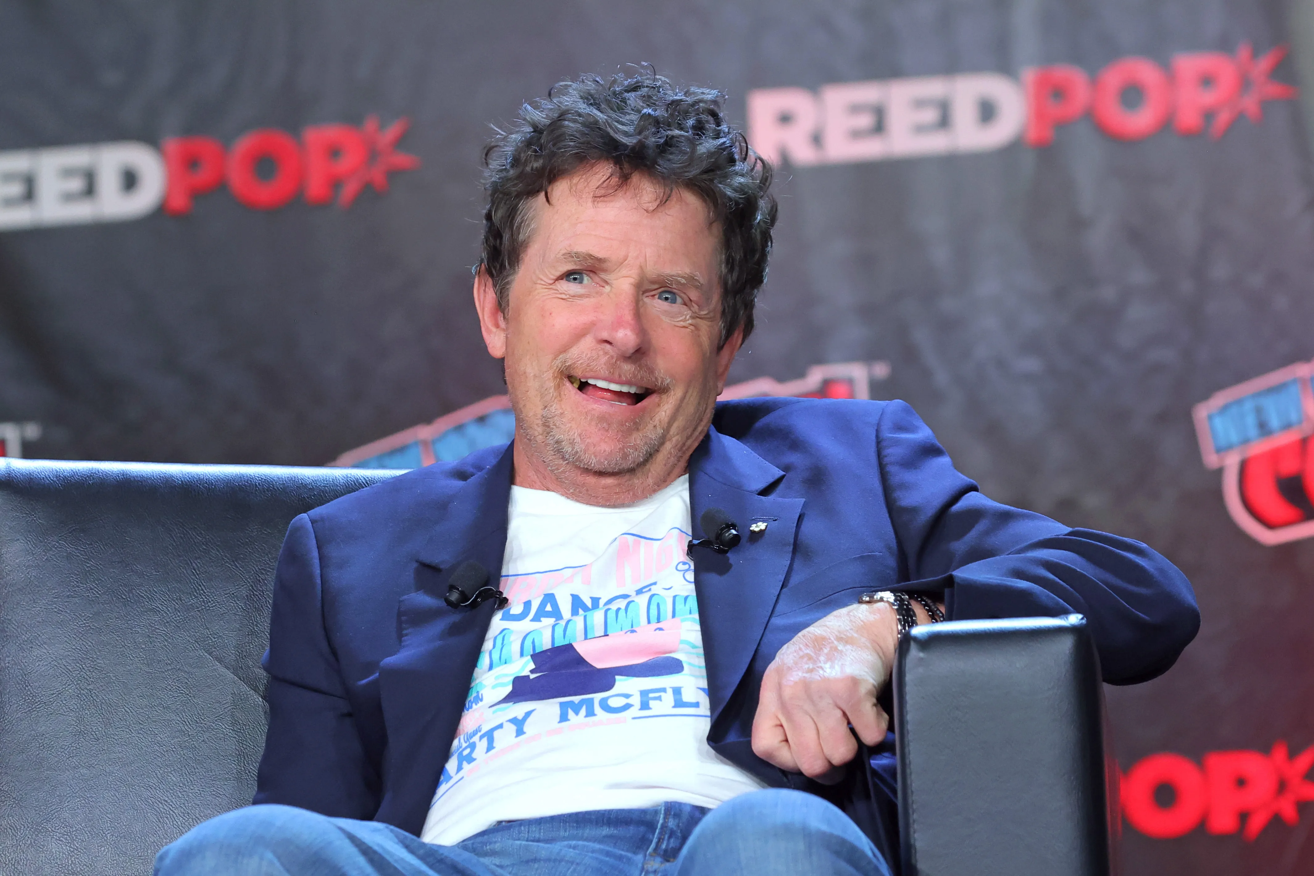 Actors Michael J. Fox speaks during a "Back To The Future Reunion" panel at New York Comic Con on October 08, 2022 in New York City. 