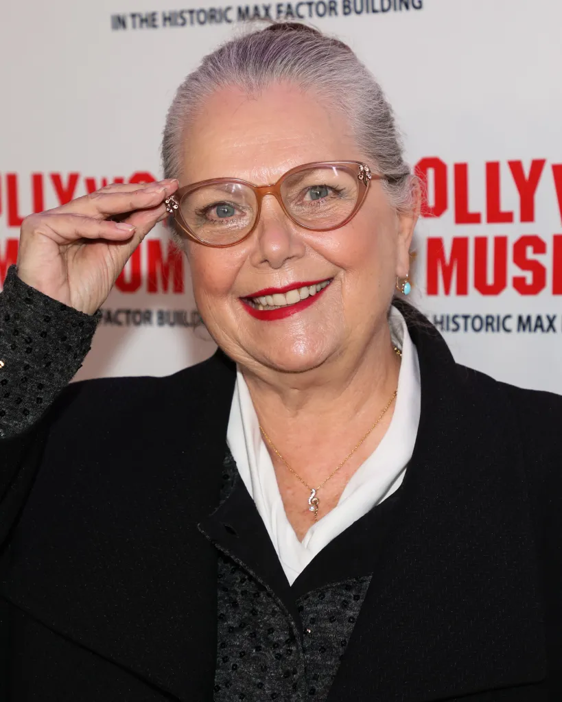 Actress Ann Jillian smiles at the unveiling of Mary Pickford's ball gown.