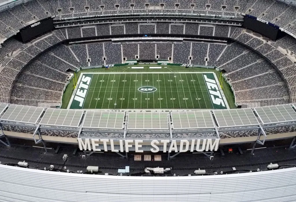 Aerial view of MetLife Stadium with "JETS" written in both end zones.