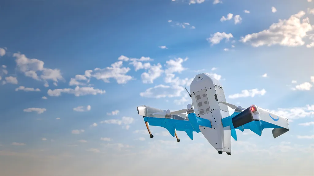 Amazon delivery drone in air.