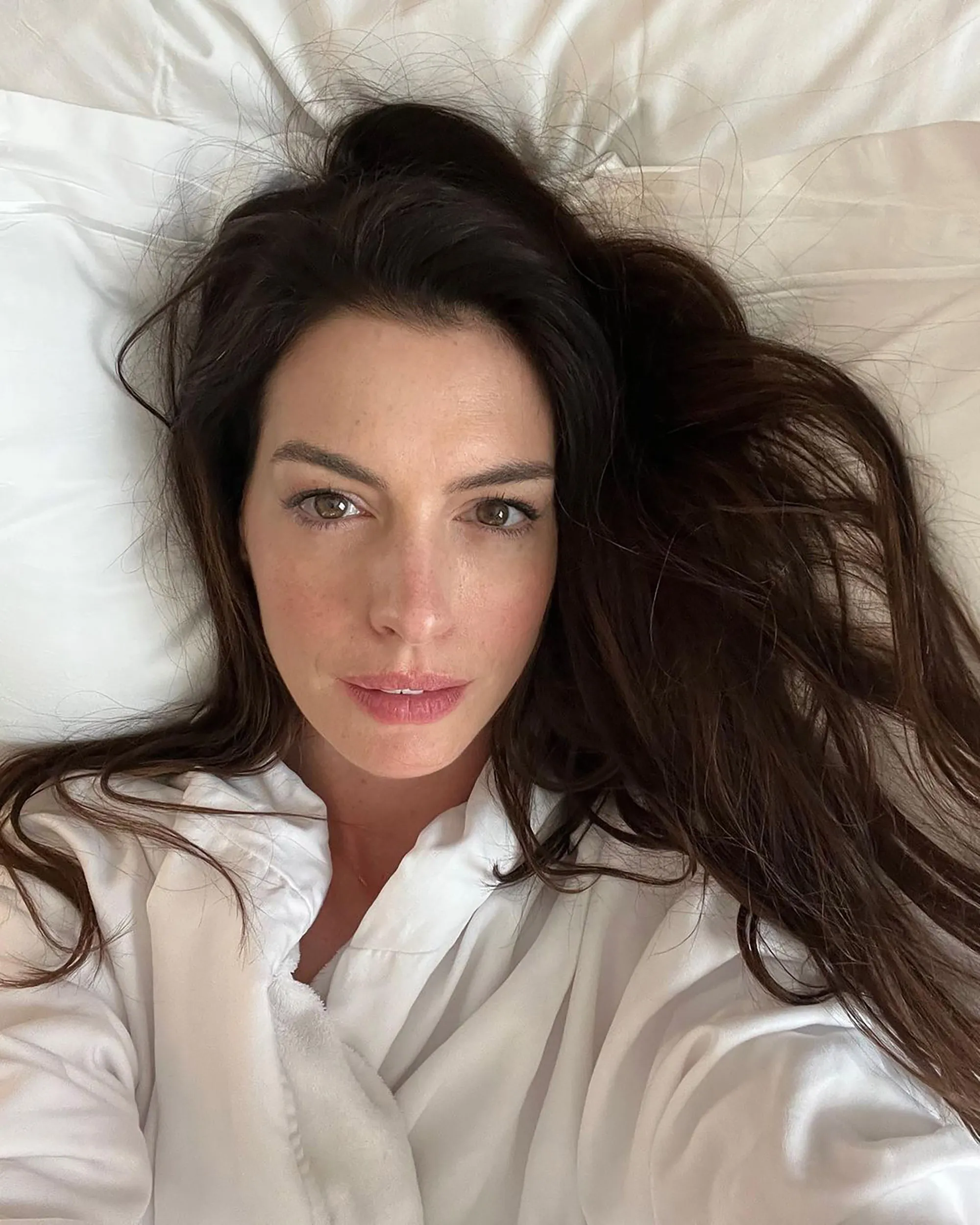 Anne Hathaway lying down