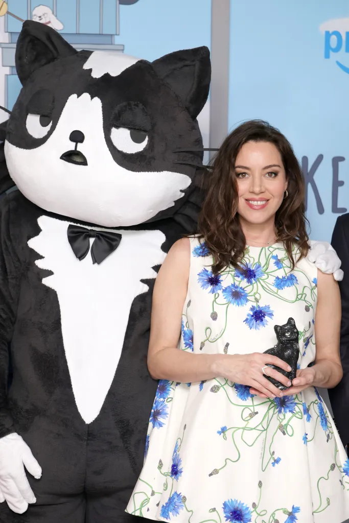 Aubrey Plaza and Kevin (mascot) pose at the Amazon Prime's 