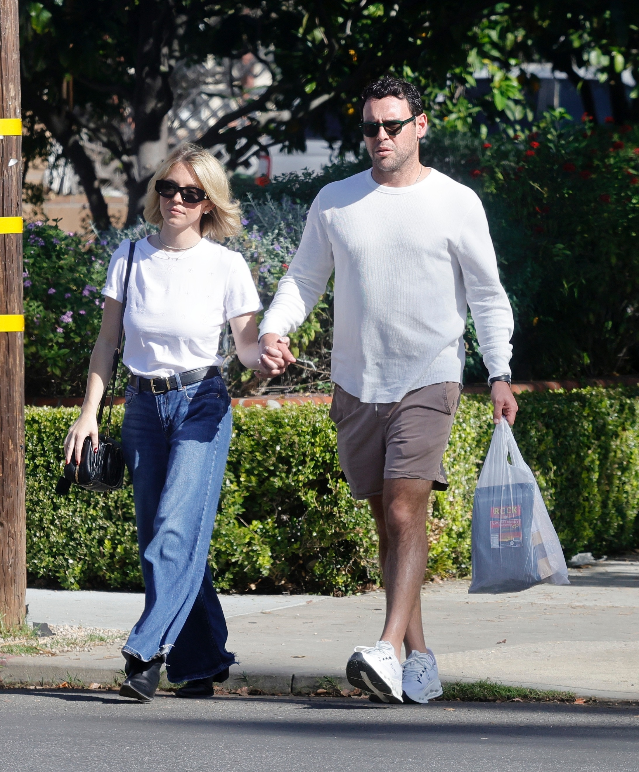 Sydney Sweeney and Scooter Braun walking in Brentwood, Los Angeles.