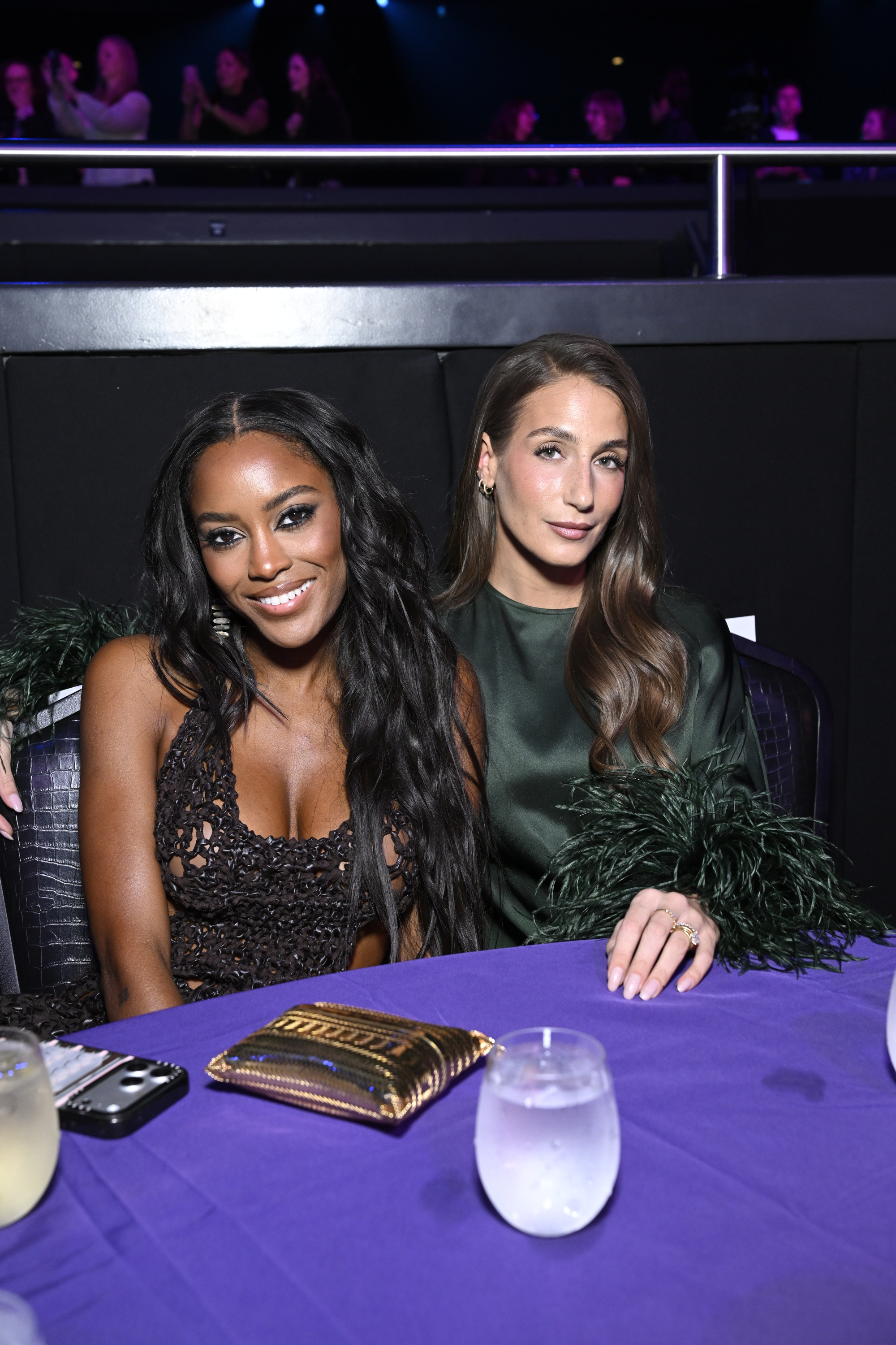 Ciara Miller and Amanda Batula smiling for a photo.