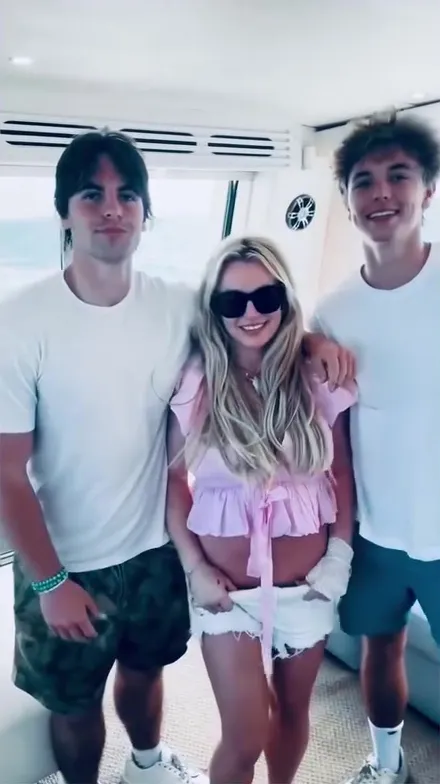 Britney Spears smiling with her sons Sean Preston and Jayden Federline.