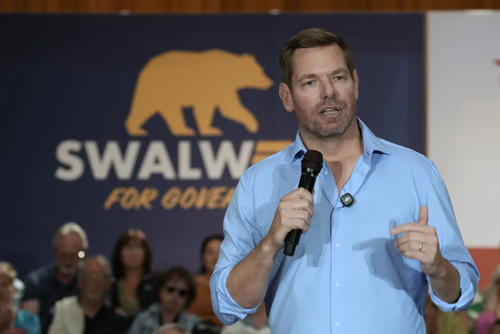 Rep. Eric Swalwell speaking at a town hall meeting in Sacramento.