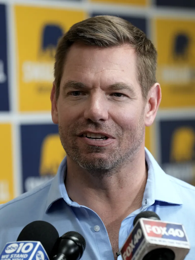 Rep. Eric Swalwell speaking to reporters after a town hall meeting.