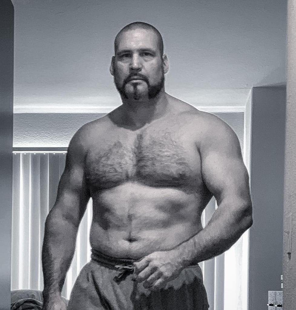 Chappell Roan's security guard shirtless.
