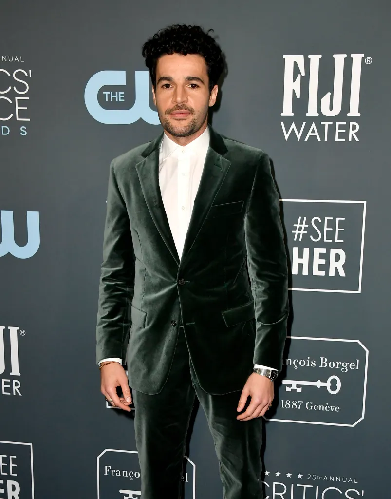 Christopher Abbott in a dark green velvet suit and white shirt at the 25th Annual Critics' Choice Awards.