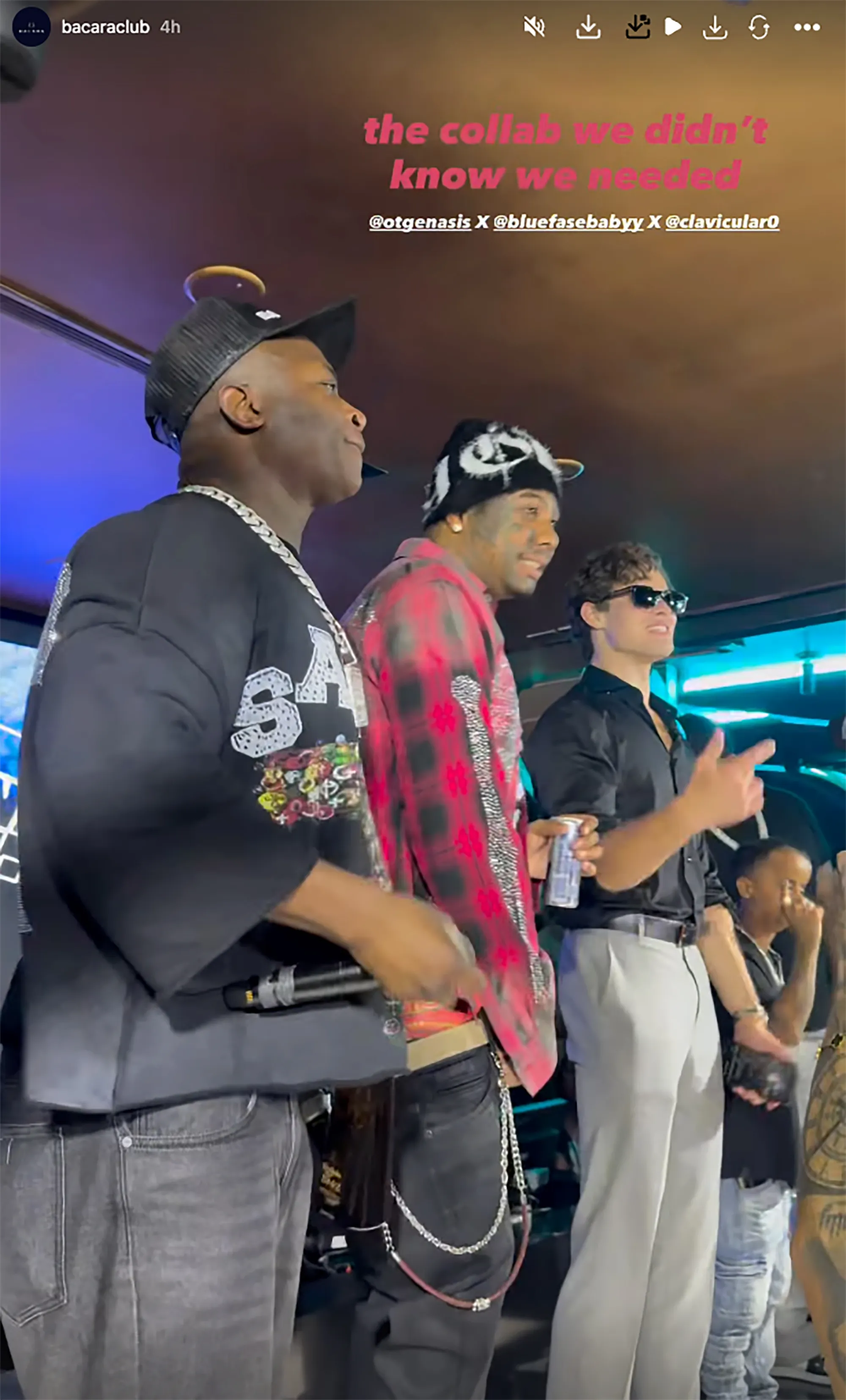 Clavicular, in a black shirt and trucker hat, makes a club appearance with Blueface and O. T. Genasis.