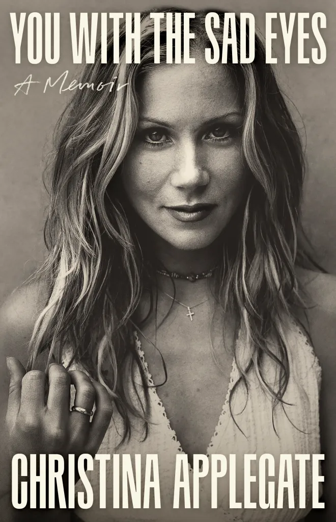 Book cover for "You with the Sad Eyes: A Memoir" by Christina Applegate, showing a black and white portrait of the actress.