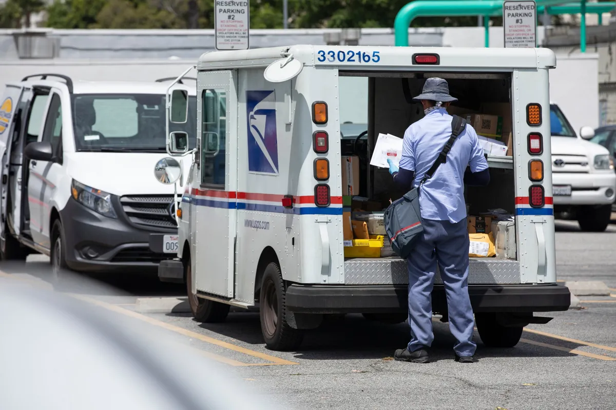 Postal workers hit back at Trump with national TV ad over attacks on mail-in voting