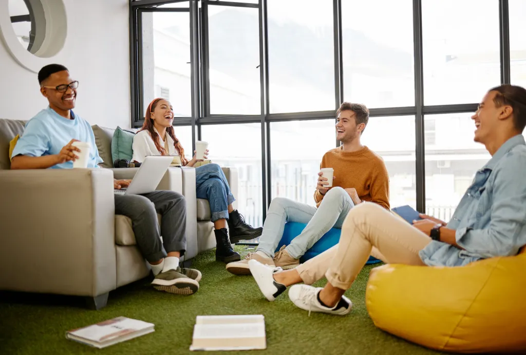 A room full of 20-something people relaxing.
