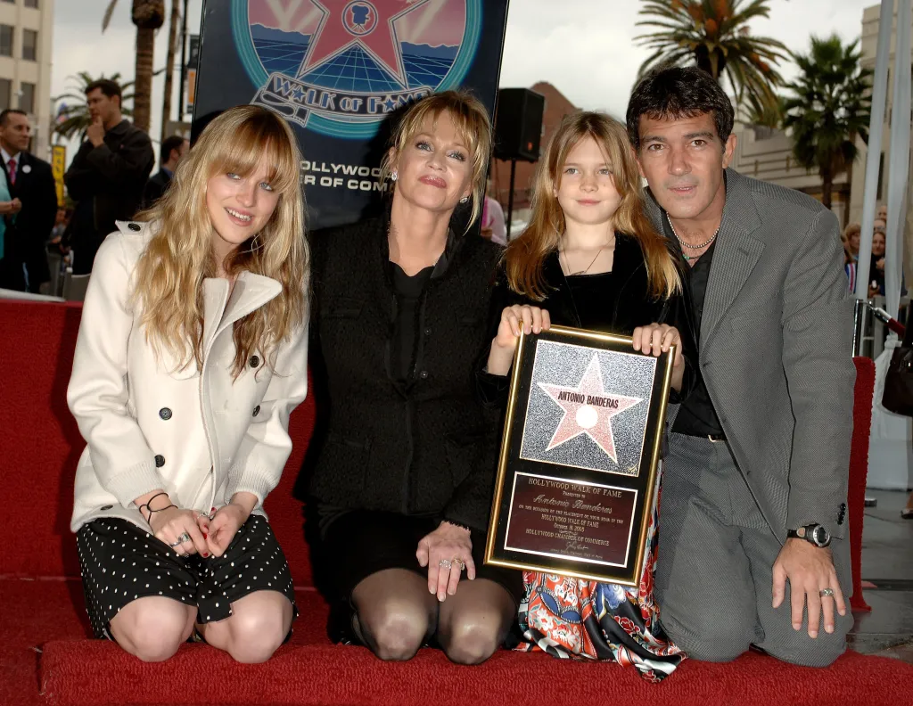Dakota Johnson, Melanie Griffith, and Stella Banderas pose with Antonio Banderas and his Hollywood Walk of Fame star.
