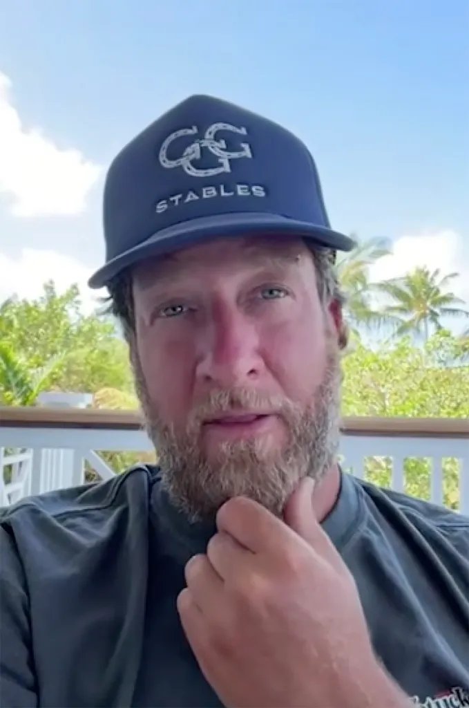 Dave Portnoy in a black baseball cap with "GG STABLES" written on it.