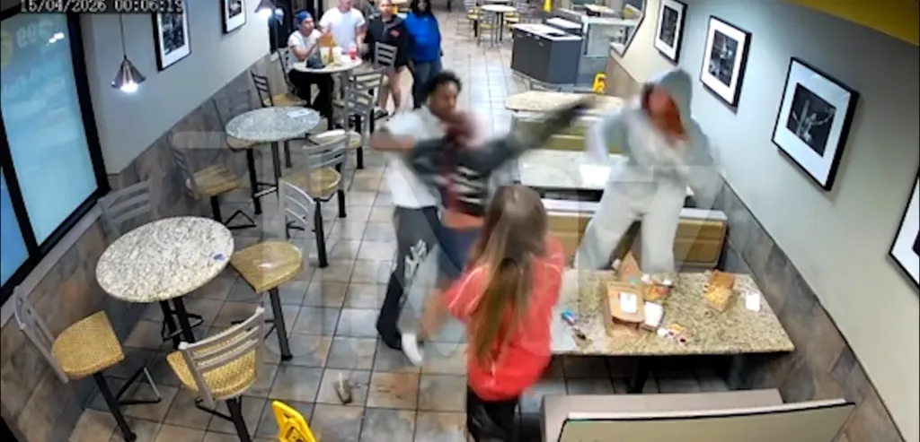 Security camera footage of a brawl in a McDonald's.
